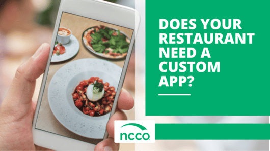 Close-up image of a phone with restaurant items and the text ‘Does Your Restaurant Need a Custom App?’ and the NCCO logo